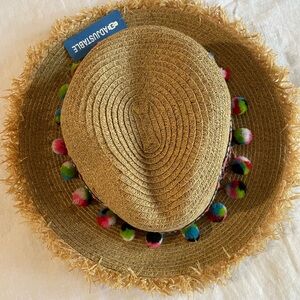 Whimsical pom pom hat with raw edge. NWT.